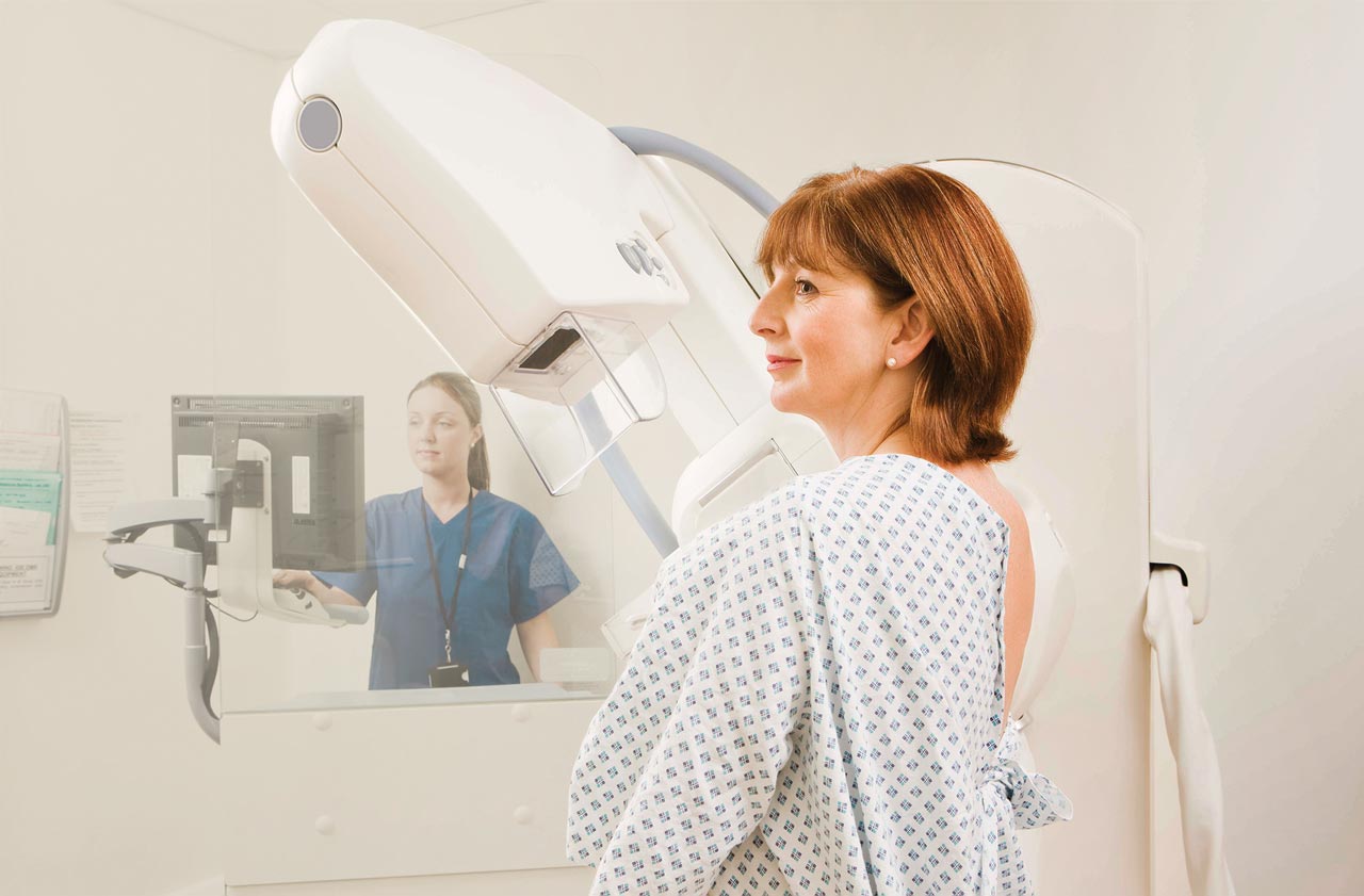 Woman doing a mammogram