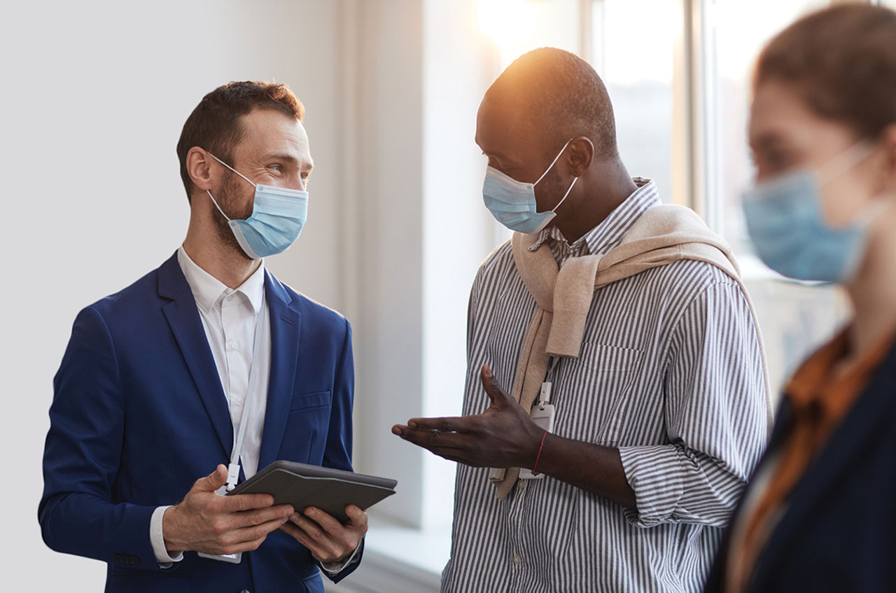 Image of two man talking with each other