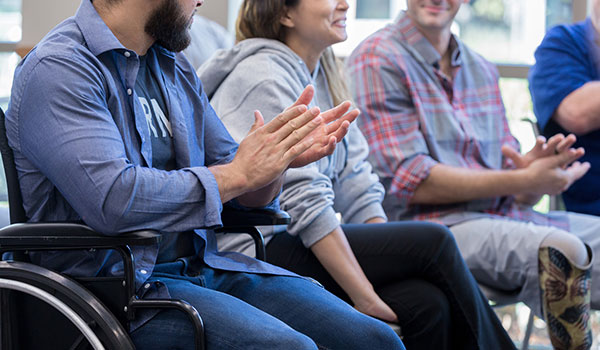 photo of group of people applauding