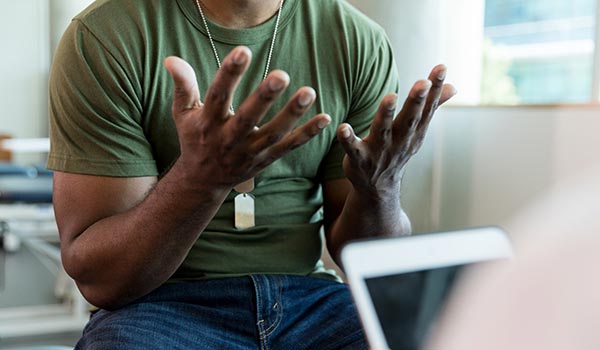 photo of soldier expressive hands talking