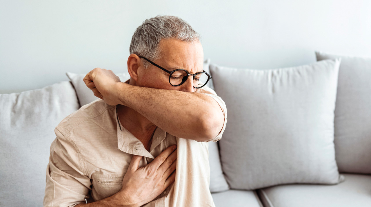photo of man coughing