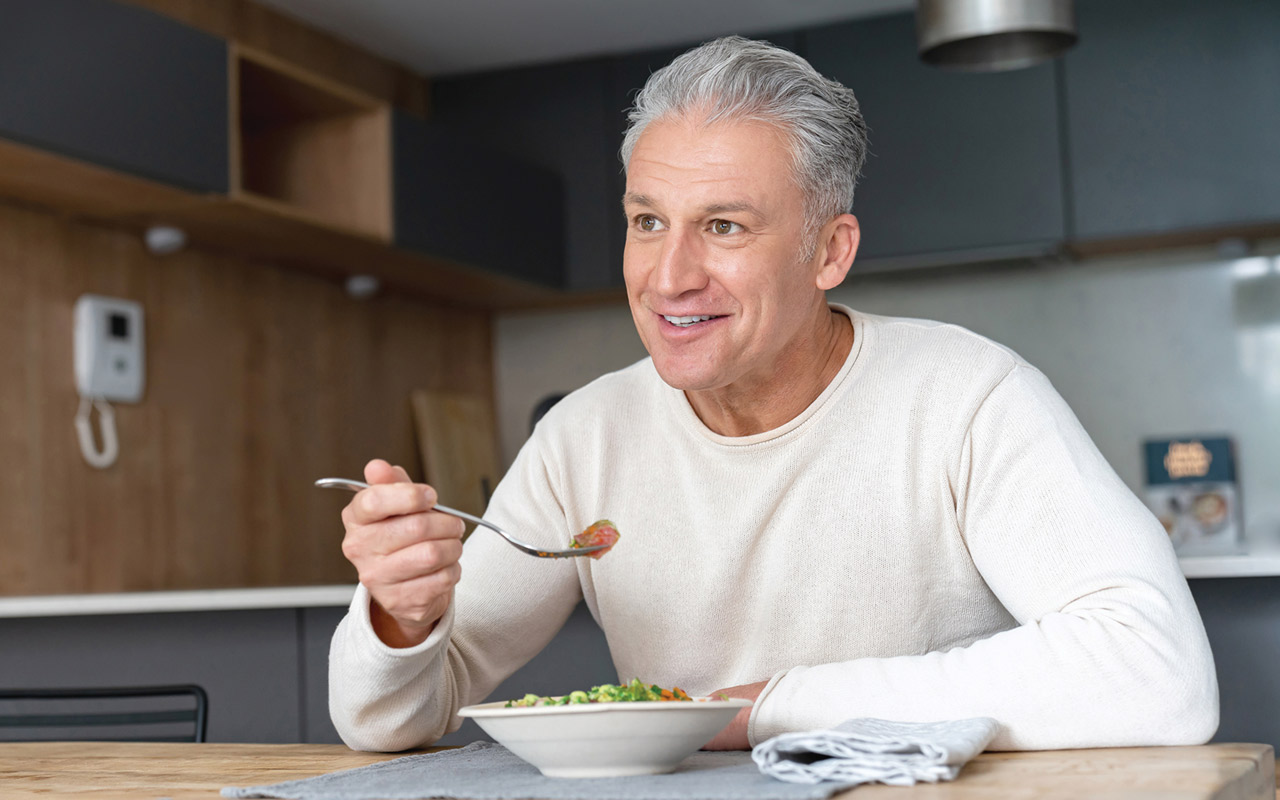 Photo of man eating