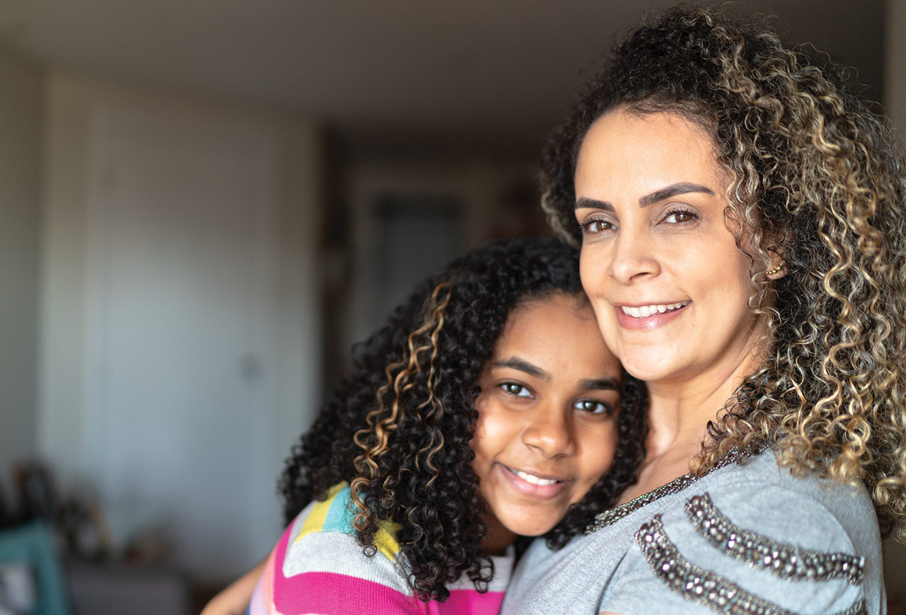 Mother and young teen daughter