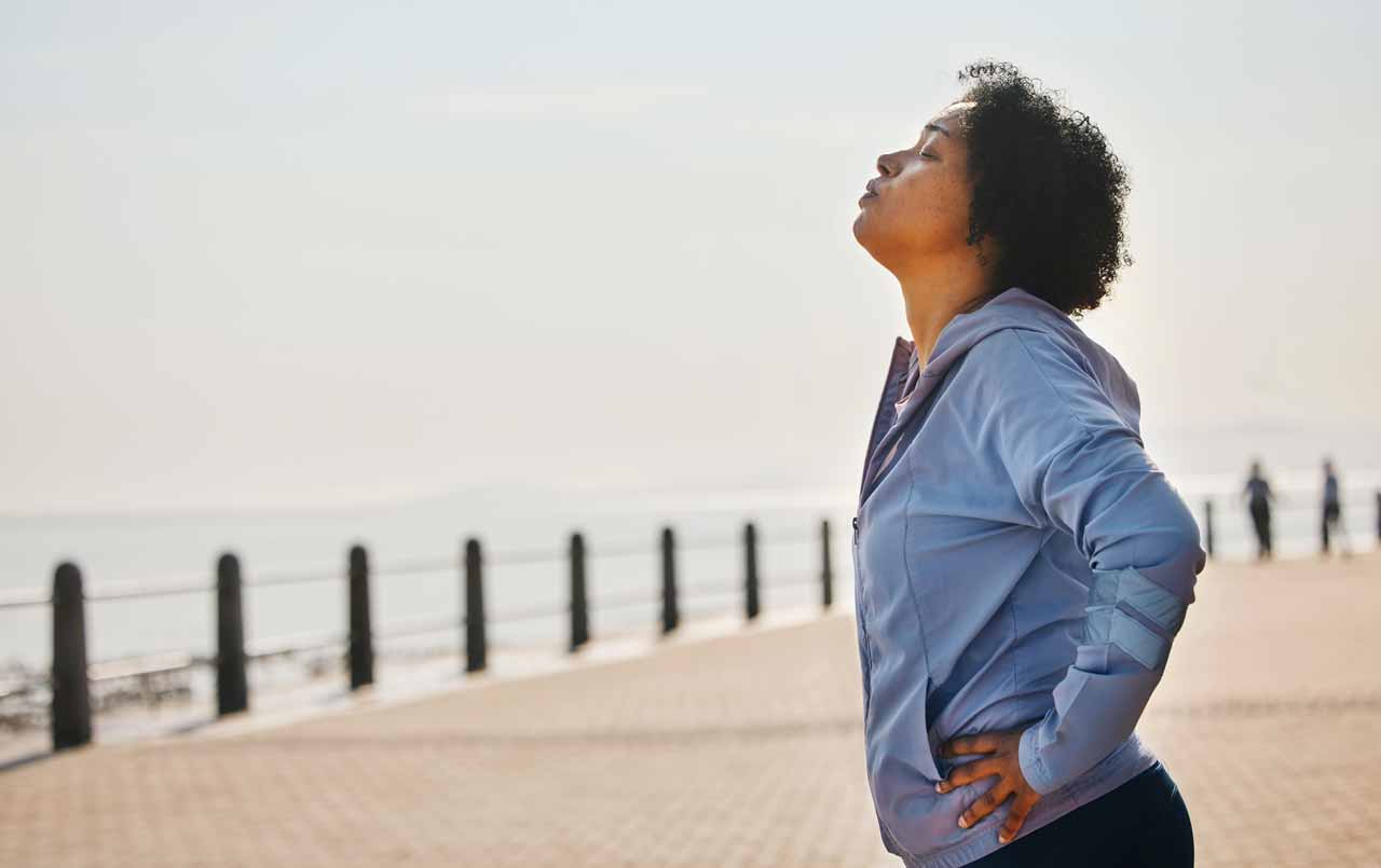 woman resting for air after physical exertion