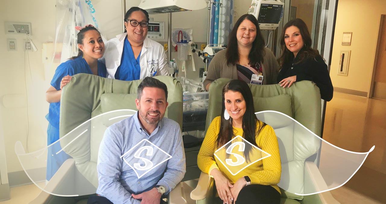 Seated: Justin Gallagher, Kelly Gallagher. Standing: Princeton Health NICU clinicians Krystle Coughlin, Dr. Marilyn Gorgi, Katelyn Brennan and Jenn Hollander